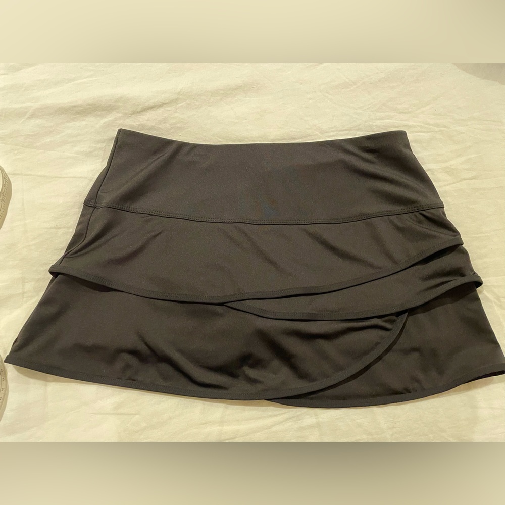 Lucky in love Black scalloped tennis skirt.